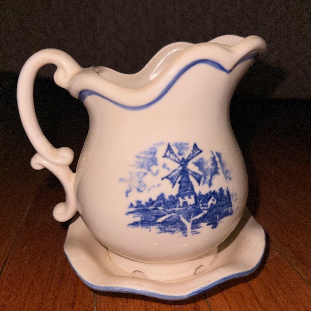 Classic White and Blue Ceramic Pitcher with Windmill Motif